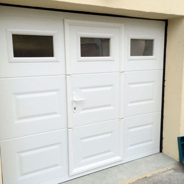 Installation porte garage champcevinel
